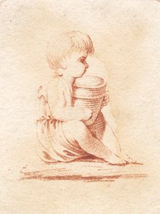 A Small Sitting Boy
