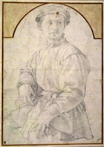A seated youth wearing a cap