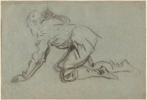 A Kneeling Man Holding a Staff