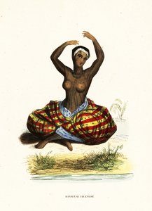 Tattooed and bare-breasted young woman dancing a hula while seated on the ground
