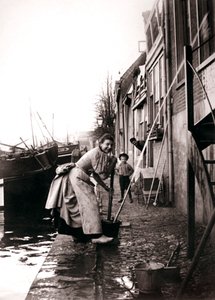 Woman Mopping the Street, Dordrecht, Netherlands by James Batkin