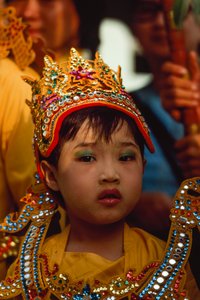 A Young Worshipper at the Tabaung Festival, Shwe Dagon Pagoda, Rangoon, Burma