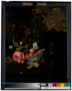 Still Life with a Bowl of Strawberries, a Rose and a Bottle on a Ledge, a Landscape Beyond