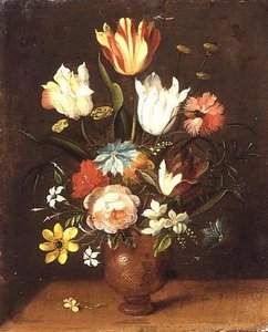 Tulips, roses, pinks and other flowers in a vase