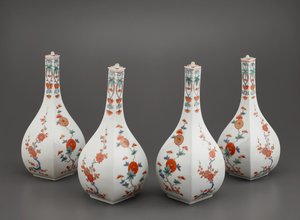Four square bottles with lids by Japanese School