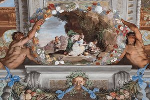 Little Bacchus with three nurses leaning over him