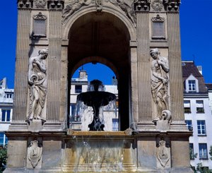 Architecture: detail of the fountain of the Innocents representing the nymphs. Designed by architects Jean Goujon, Augustin Pajou and Pierre Lescot. 1546-1549. Place Joachim du Bellay, Paris.