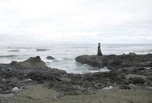Solitary Woman Coastal View by Jeffrey Hummel