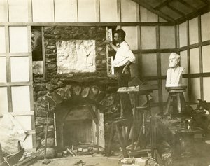 Karl Bitter (sculptor) building his fireplace himself by Jessie Tarbox Beals