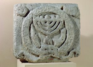 Relief depicting a menorah, from Umm Qeis (Ancient Gadara) Jordan by Jewish School