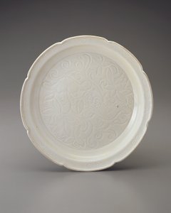 Dish with foliate rim and carved decoration by Jin Dynasty Chinese School