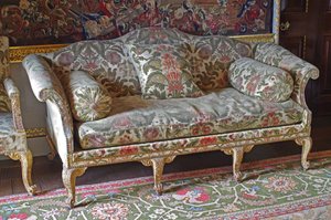 A George III Giltwood Humpback soda-bedstead by John Bladwell