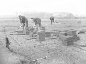 Turf Cutters Cutting, Lifting and Stacking Turf by Joseph Hardman