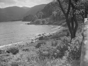 View of lakeshore and hills in background by Joseph Hardman