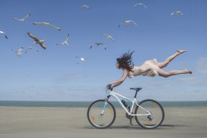 Flying Woman Beach Bike by Karim Aboukelela