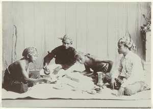Four Young Men Drinking Coffee or Tea