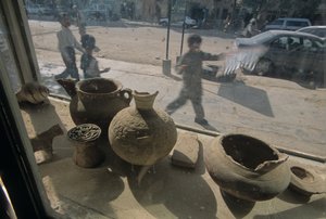 Afghanistan, Herat, antiquities for sale, window display, street scene, 2004