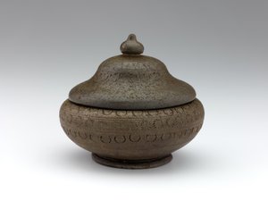 Cinerary urn with impressed decoration, late 7th century