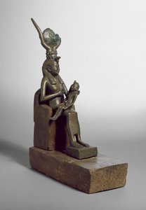 Votive statuette of Isis suckling the child Horus, found at Saqqara together with original wooden throne and base