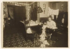 Home Work (Woman at Sewing Machine) by Lewis W. Hine