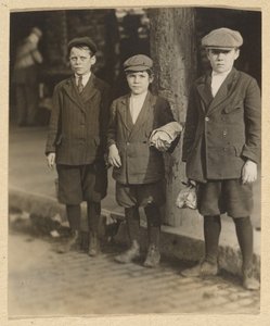 Three Boys on City Street in Knickers and Caps
