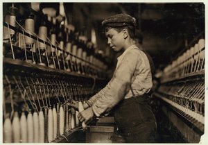 A Doffer Replaces Full Bobbins at Globe Cotton Mill, Augusta, Georgia by Lewis Wickes Hine