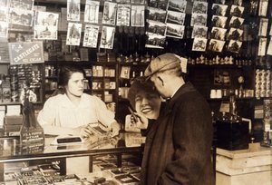 Mary Creed, aged 14, selling cigars, c.1930 by Lewis Wickes Hine