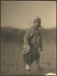 Child Wearing a Bonnet in Field by Louis Fleckenstein