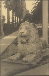 Child on Lion Statue by Louis Fleckenstein