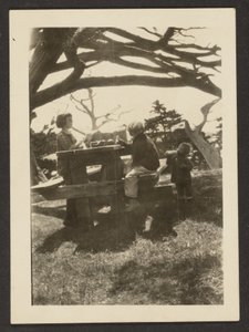Children at a Picnic Table by Louis Fleckenstein