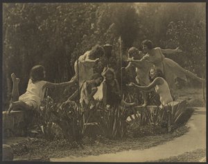 Dancers Posed Along Garden Wall by Louis Fleckenstein