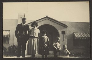 Family Portrait Before House by Louis Fleckenstein