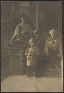 Family Portrait Outside House