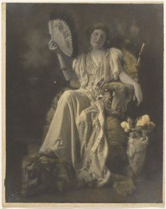 Florence Seated in a Chair with Tiger Rug