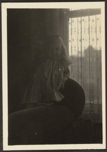 Little Girl Leaning on Chair Back by Louis Fleckenstein