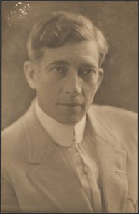 [Man in Light Suit]