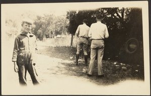 Men Outside with Junk by Louis Fleckenstein