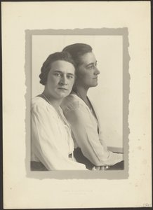 Portrait of Two Women Against White Backdrop