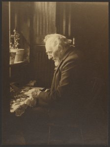 Portrait of a Man Working at Desk by Louis Fleckenstein