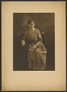 Portrait of a Seated Woman in Dress with Ribbon Accents by Louis Fleckenstein