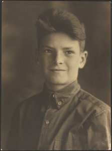 [Portrait of a Young Boy in Button Up Shirt] by Louis Fleckenstein