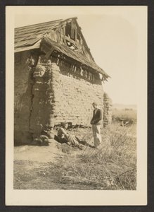 Two Men Near Crumbling Cottage by Louis Fleckenstein