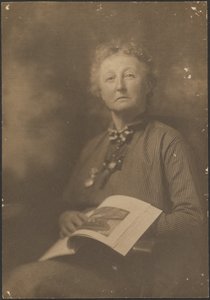 Woman Holding Magazine by Louis Fleckenstein