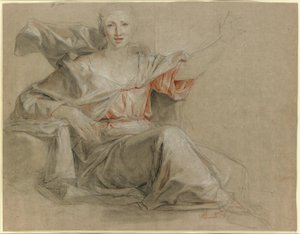 A seated woman, her left arm raised
