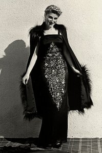 Model in evening dress created by the couture house "Graldi"