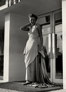 Model in evening dress created by the couture house "Graldi"