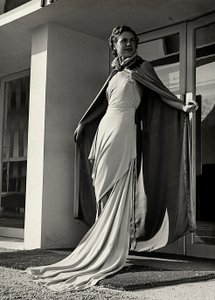 Model in evening dress created by the couture house Graldi