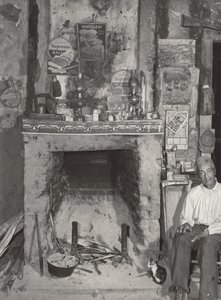 Man Near a Fireplace
