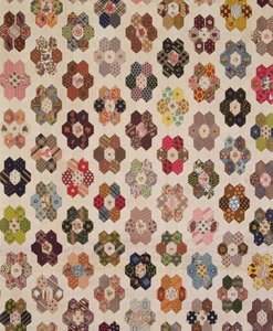 Detail of a patchwork bedcover by Mary Butler