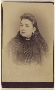 Unidentified woman with long wavy hair